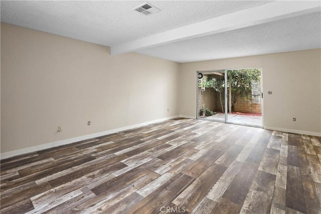 845 Daffodil Dr, Riverside, CA 92507 - empty room featuring wood finished floors, a textured ceiling, beam ceiling, and baseboards