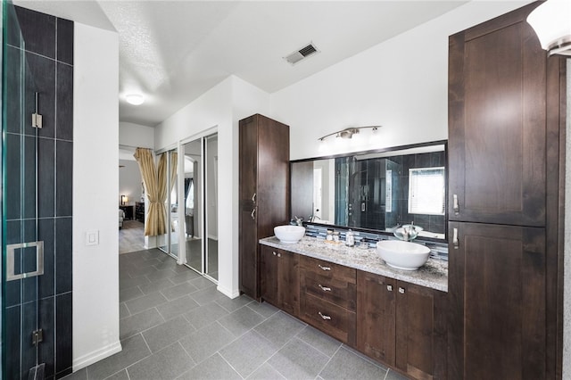 32871 Levi Ct, Temecula, CA 92592 - full bath featuring double vanity and tile patterned floors
