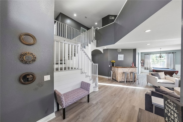 32871 Levi Ct, Temecula, CA 92592 - stairs with billiards table, wood finished floors, bar area, and recessed lighting