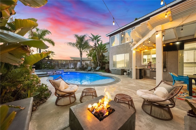 32871 Levi Ct, Temecula, CA 92592 - view of swimming pool featuring a fire pit, a fenced backyard, a patio area, and a pool with connected hot tub