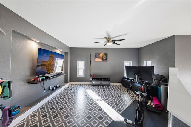 32871 Levi Ct, Temecula, CA 92592 - workout area featuring a ceiling fan, tile patterned floors, and a textured wall