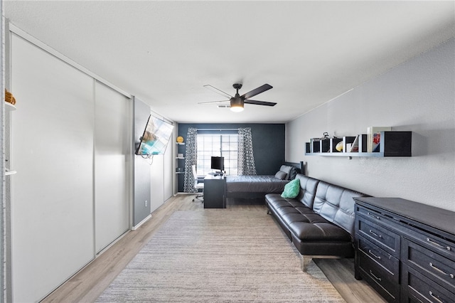 32871 Levi Ct, Temecula, CA 92592 - living room featuring light wood finished floors, a ceiling fan, and an office area