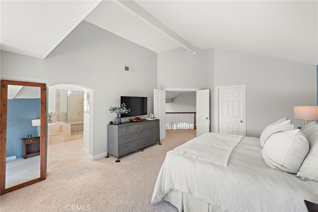 8 Capri, Laguna Niguel, CA 92677 - carpeted bedroom featuring baseboards, high vaulted ceiling, arched walkways, beamed ceiling, and ensuite bathroom