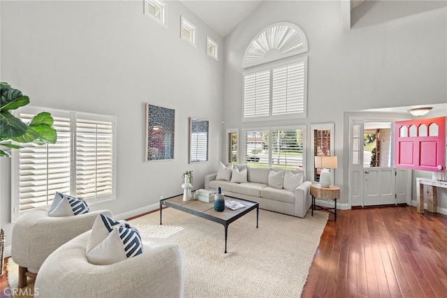 8 Capri, Laguna Niguel, CA 92677 - living area featuring high vaulted ceiling, hardwood / wood-style floors, and baseboards