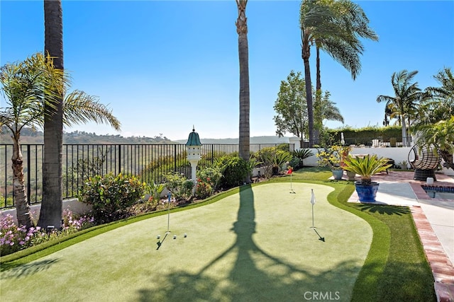 8 Capri, Laguna Niguel, CA 92677 - view of community featuring a putting green and a fenced backyard