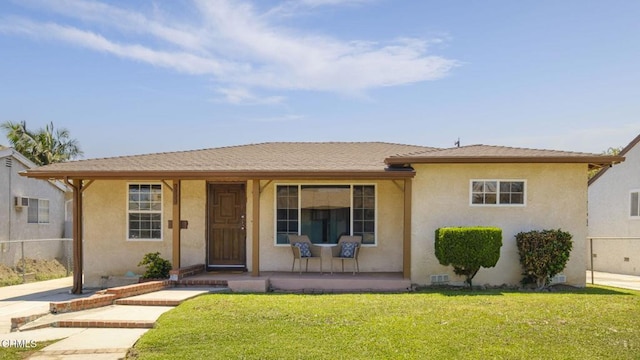 9544 Steele St, Rosemead, CA 91770 - view of front of house with a porch, stucco siding, and a front lawn