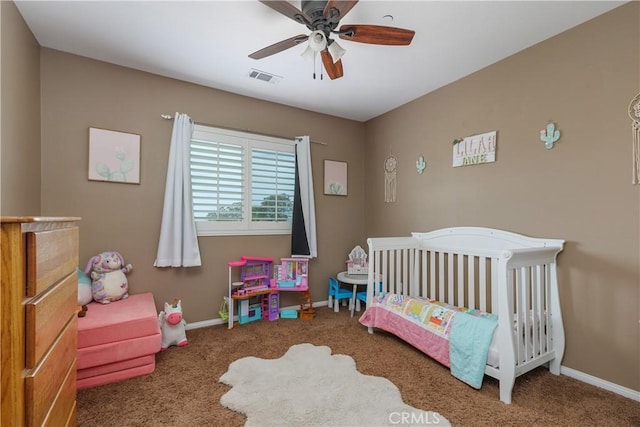 1709 Duncan Way, Corona, CA 92881 - carpeted bedroom featuring baseboards, a crib, and a ceiling fan