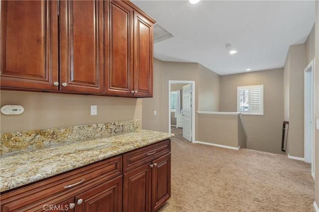 1709 Duncan Way, Corona, CA 92881 - kitchen featuring light carpet, light stone counters, baseboards, and recessed lighting