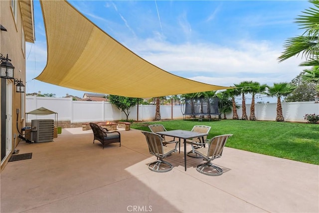 1709 Duncan Way, Corona, CA 92881 - view of patio featuring a trampoline, central AC unit, and outdoor dining area