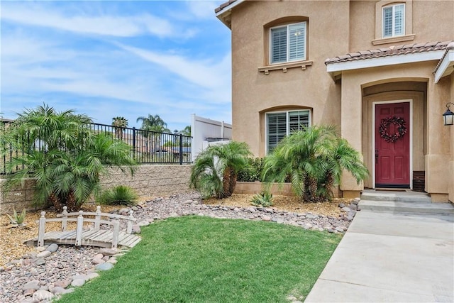1709 Duncan Way, Corona, CA 92881 - entrance to property featuring stucco siding and a tile roof