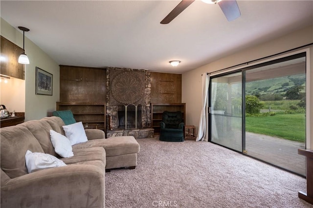 3876 Orcutt Rd, San Luis Obispo, CA 93401 - carpeted living area featuring a ceiling fan and a fireplace
