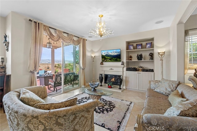 27781 Country Lane Rd, Laguna Niguel, CA 92677 - living room featuring a chandelier and a glass covered fireplace