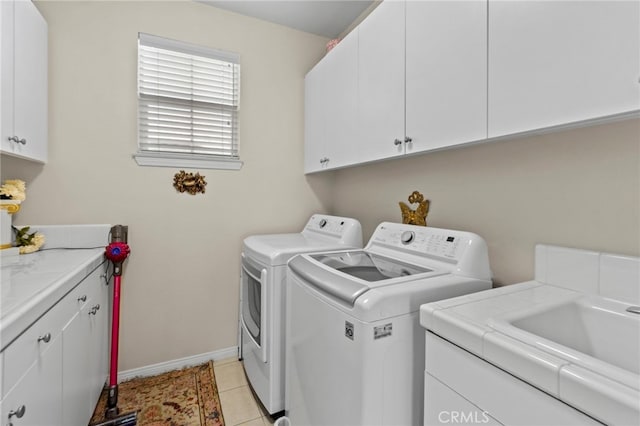 27781 Country Lane Rd, Laguna Niguel, CA 92677 - washroom with cabinet space, washer and dryer, baseboards, and light tile patterned flooring