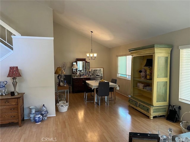 22523 Enadia Way, West Hills, CA 91307 - dining area with a chandelier, wood finished floors, lofted ceiling, and baseboards