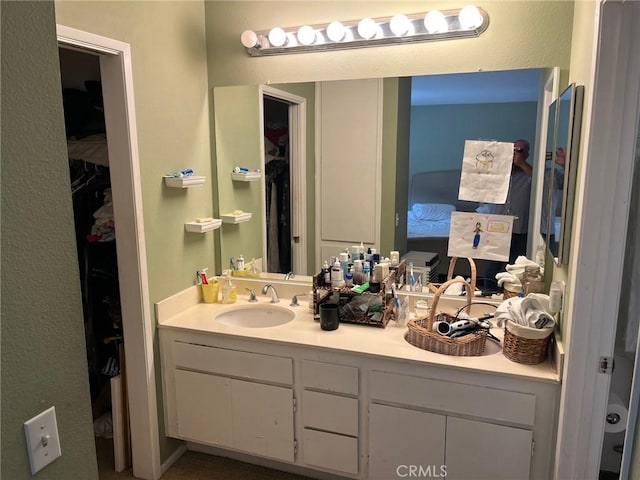 22523 Enadia Way, West Hills, CA 91307 - bathroom featuring vanity and a textured wall
