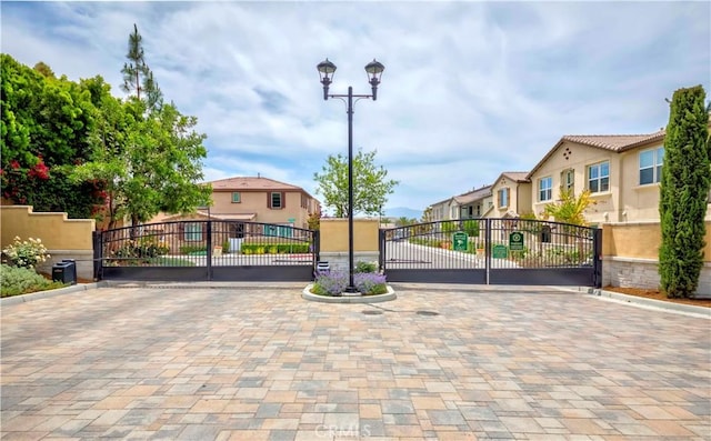 14533 Verona Pl, Eastvale, CA 92880 - gate featuring a residential view