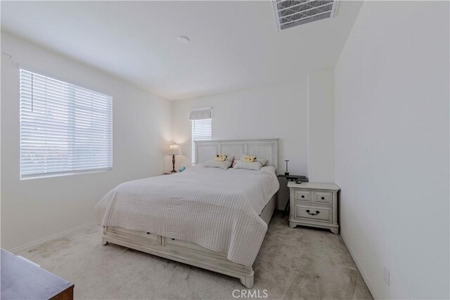 14533 Verona Pl, Eastvale, CA 92880 - bedroom featuring light colored carpet and baseboards