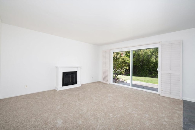 4402 Shearwater Way, Oceanside, CA 92057 - unfurnished living room featuring a glass covered fireplace and carpet floors