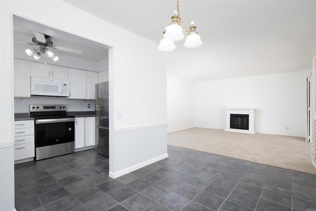 4402 Shearwater Way, Oceanside, CA 92057 - kitchen featuring stainless steel appliances, white cabinetry, a chandelier, and dark carpet