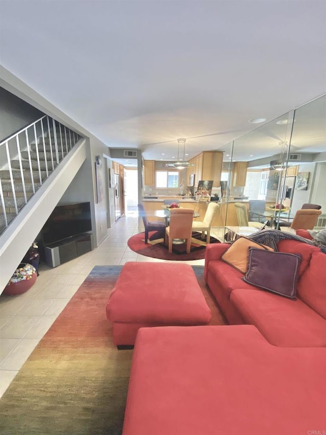 34354 Laura Way, Rancho Mirage, CA 92270 - living area featuring light tile patterned flooring and stairway