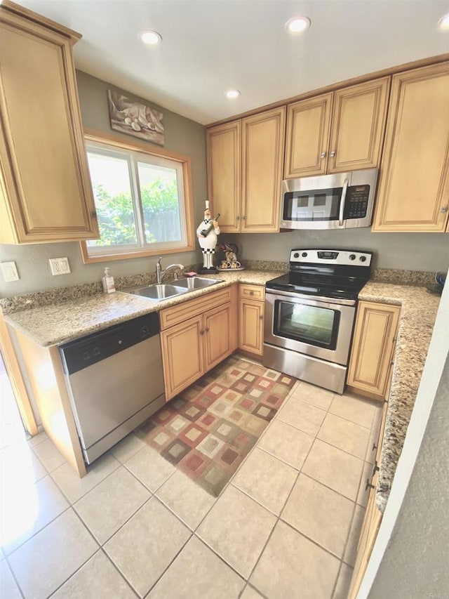 34354 Laura Way, Rancho Mirage, CA 92270 - kitchen with appliances with stainless steel finishes, a sink, recessed lighting, light tile patterned floors, and light brown cabinets