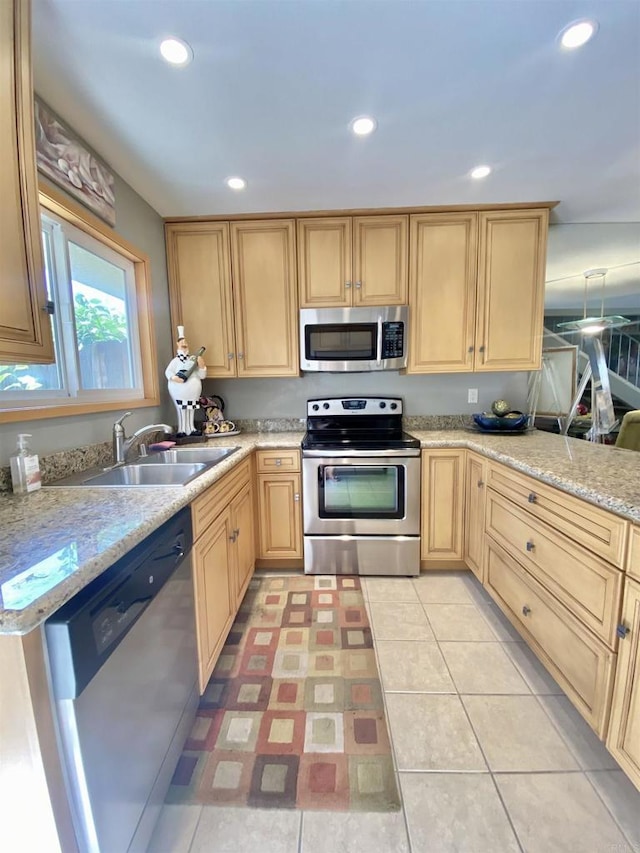 34354 Laura Way, Rancho Mirage, CA 92270 - kitchen with stainless steel appliances, light brown cabinetry, a sink, recessed lighting, and light stone counters