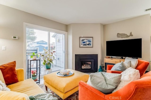 150 Cypress Ave Unit 28, Cayucos, CA 93430 - living room with a glass covered fireplace