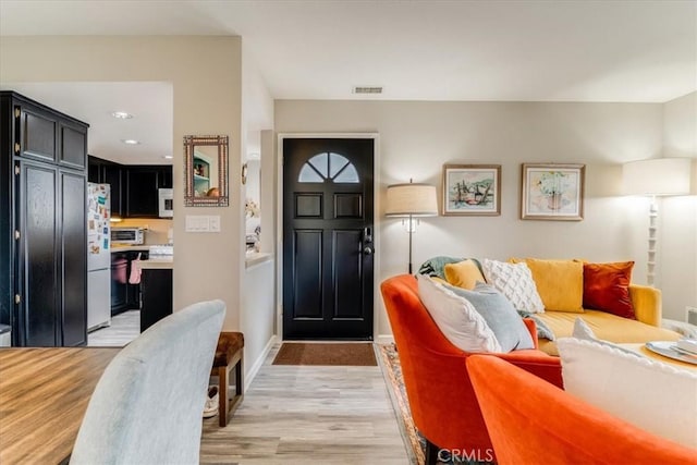 150 Cypress Ave Unit 28, Cayucos, CA 93430 - foyer with light wood-style flooring, recessed lighting, and baseboards