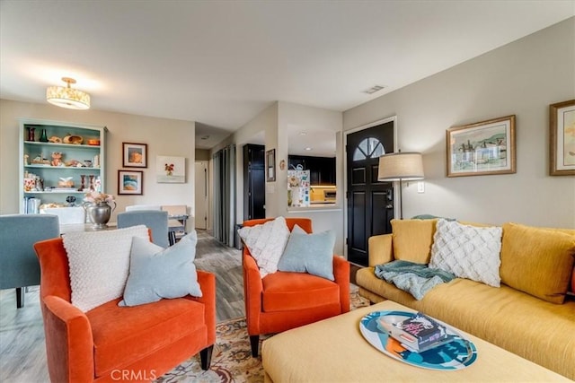 150 Cypress Ave Unit 28, Cayucos, CA 93430 - living room featuring wood finished floors