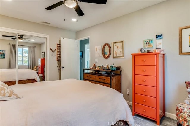 150 Cypress Ave Unit 28, Cayucos, CA 93430 - bedroom featuring wood finished floors, baseboards, and a ceiling fan