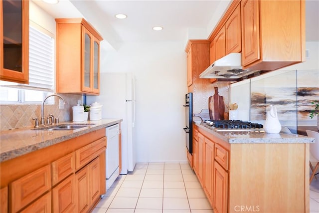 3844 W 181st St, Torrance, CA 90504 - kitchen featuring a sink, tasteful backsplash, white dishwasher, under cabinet range hood, and light stone counters
