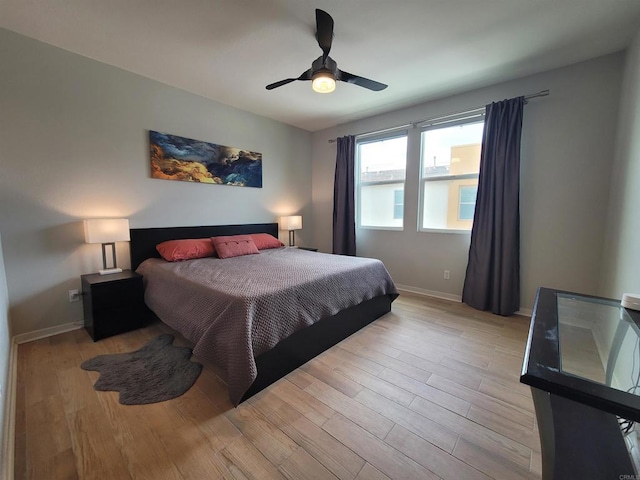 2072 Tango Loop Unit 2, Chula Vista, CA 91915 - bedroom with light wood-style flooring, baseboards, and ceiling fan