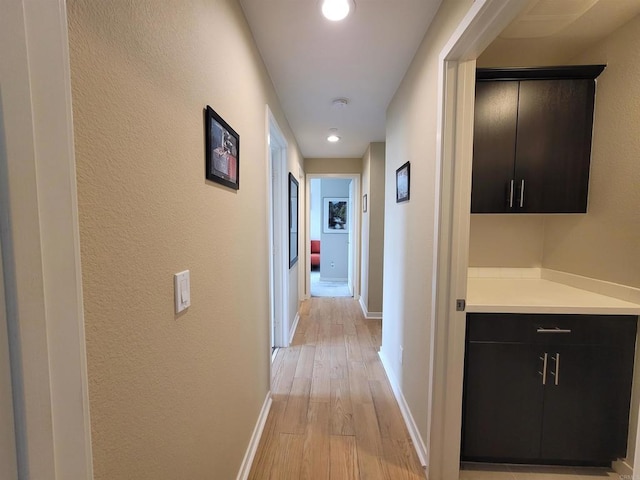 2072 Tango Loop Unit 2, Chula Vista, CA 91915 - corridor featuring light wood-style flooring, baseboards, recessed lighting, and a textured wall