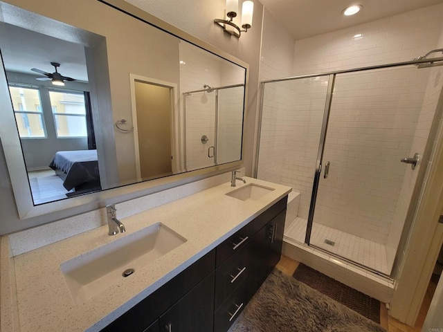 2072 Tango Loop Unit 2, Chula Vista, CA 91915 - ensuite bathroom featuring a shower stall, ceiling fan, double vanity, and recessed lighting