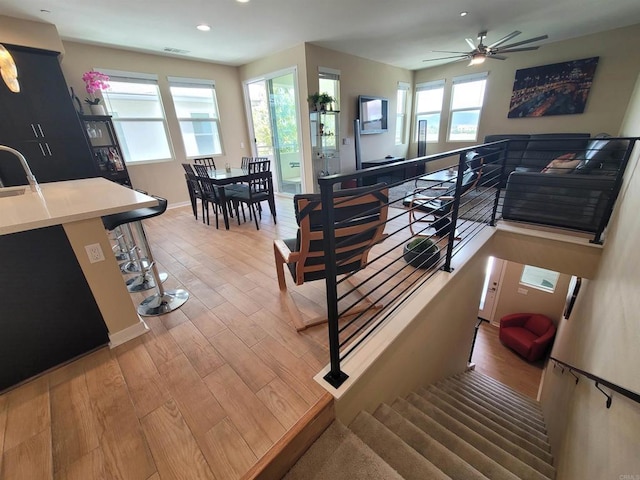 2072 Tango Loop Unit 2, Chula Vista, CA 91915 - staircase featuring wood finished floors, recessed lighting, baseboards, and a ceiling fan
