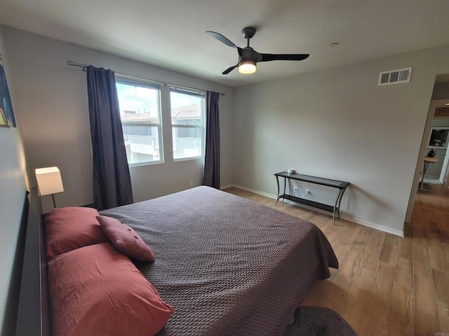 2072 Tango Loop Unit 2, Chula Vista, CA 91915 - bedroom featuring light wood-style flooring, baseboards, and ceiling fan