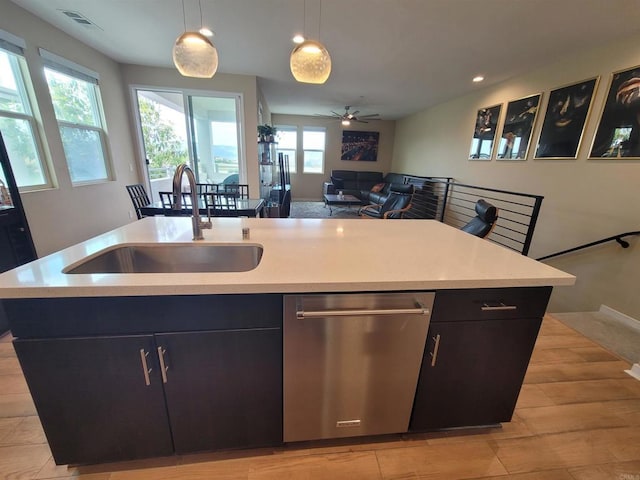 2072 Tango Loop Unit 2, Chula Vista, CA 91915 - kitchen with dishwasher, a sink, open floor plan, a center island with sink, and ceiling fan