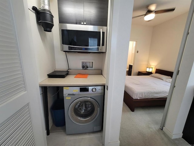 2072 Tango Loop Unit 2, Chula Vista, CA 91915 - laundry area with washer / dryer and light carpet