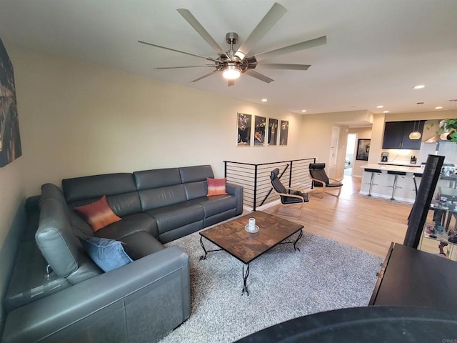 2072 Tango Loop Unit 2, Chula Vista, CA 91915 - living room with light wood finished floors, ceiling fan, and recessed lighting