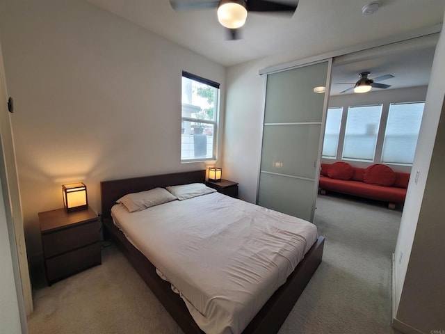 2072 Tango Loop Unit 2, Chula Vista, CA 91915 - bedroom with light colored carpet and a ceiling fan