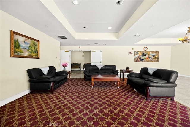 tiled living area featuring a raised ceiling, carpet floors, baseboards, and recessed lighting