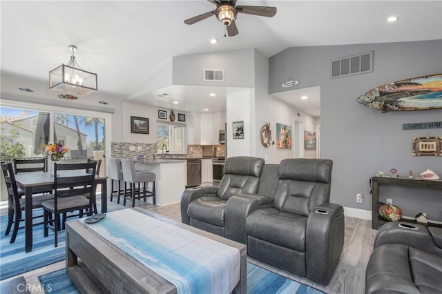 37 Fleurance St, Laguna Niguel, CA 92677 - living area featuring lofted ceiling, ceiling fan, recessed lighting, a chandelier, and baseboards