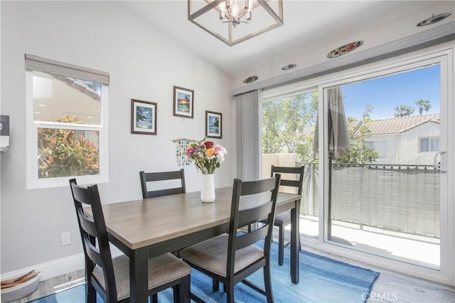 37 Fleurance St, Laguna Niguel, CA 92677 - dining area featuring a chandelier, baseboards, and wood finished floors