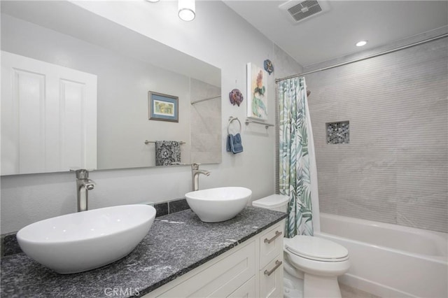 37 Fleurance St, Laguna Niguel, CA 92677 - bathroom featuring shower / bath combo, toilet, double vanity, and recessed lighting