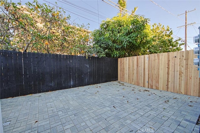 2202 Thurman Ave, Los Angeles, CA 90016 - view of patio with a fenced backyard