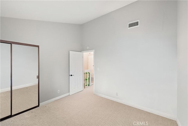 12750 Centralia St Unit 215, Lakewood, CA 90715 - unfurnished bedroom with carpet floors, a closet, and baseboards