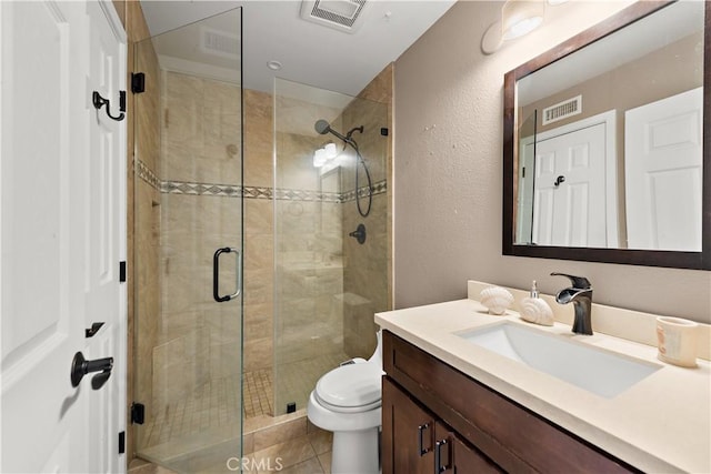 12750 Centralia St Unit 215, Lakewood, CA 90715 - bathroom with a shower stall, toilet, vanity, and a textured wall