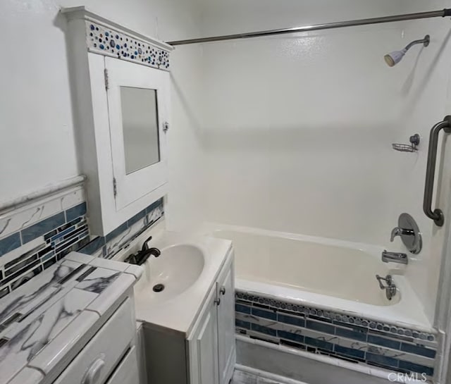 581 N Euclid Ave, Upland, CA 91786 - full bath with vanity, tiled shower / bath combo, and backsplash