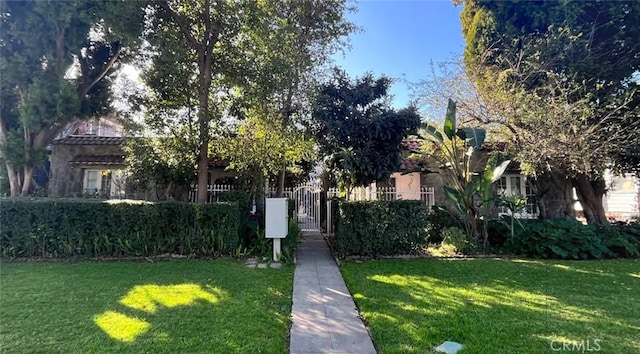 581 N Euclid Ave, Upland, CA 91786 - view of property hidden behind natural elements featuring a gate