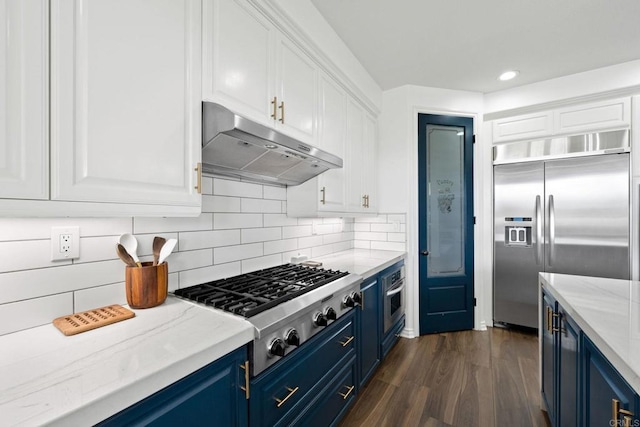 34056 Vandale Ct, Temecula, CA 92592 - kitchen featuring blue cabinetry, appliances with stainless steel finishes, under cabinet range hood, white cabinetry, and recessed lighting